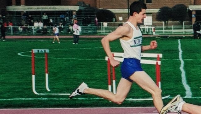 Brendon Smith competing in a track meet in 2002