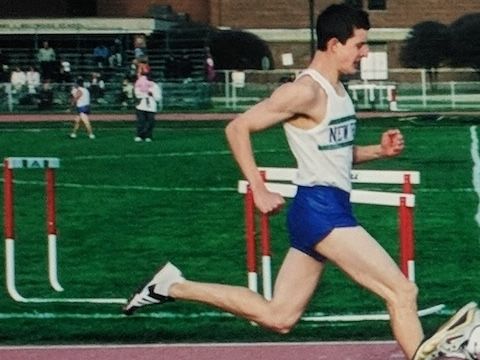 Brendon Smith competing in a track meet in 2002