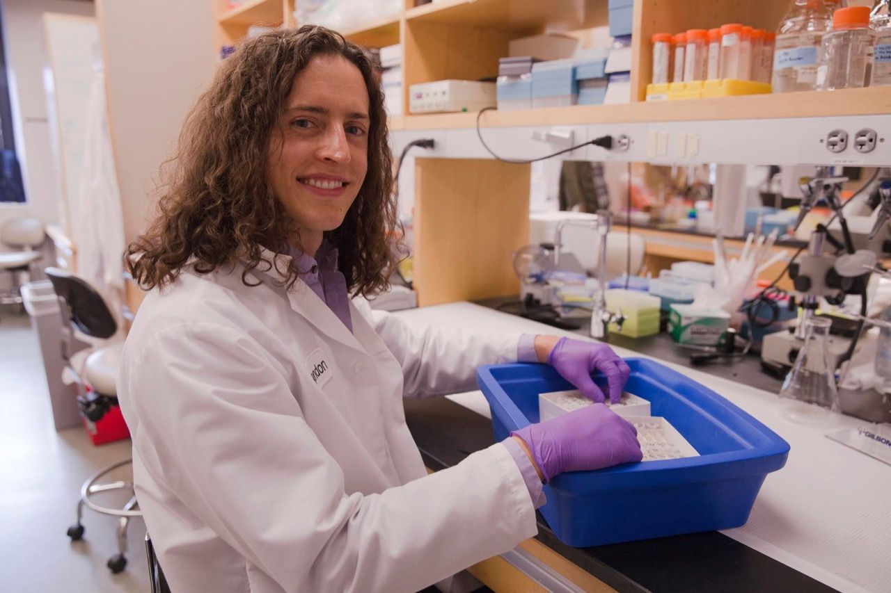 Brendon Smith at postdoc lab bench at Harvard